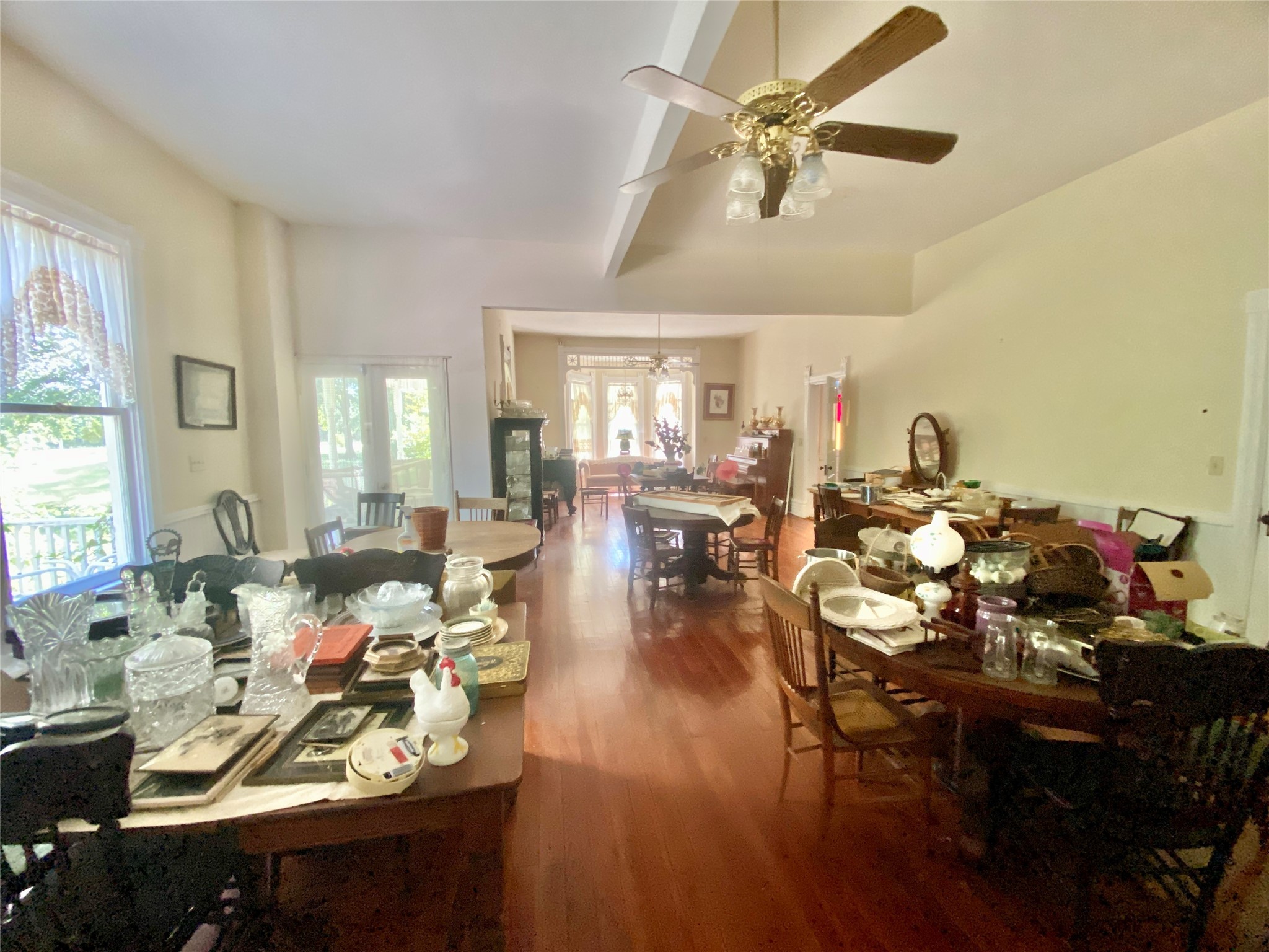 2221 Sandtown Road Washington, GA 30673 - Photo 14 of 50 a living room with lots of furniture and a chandelier