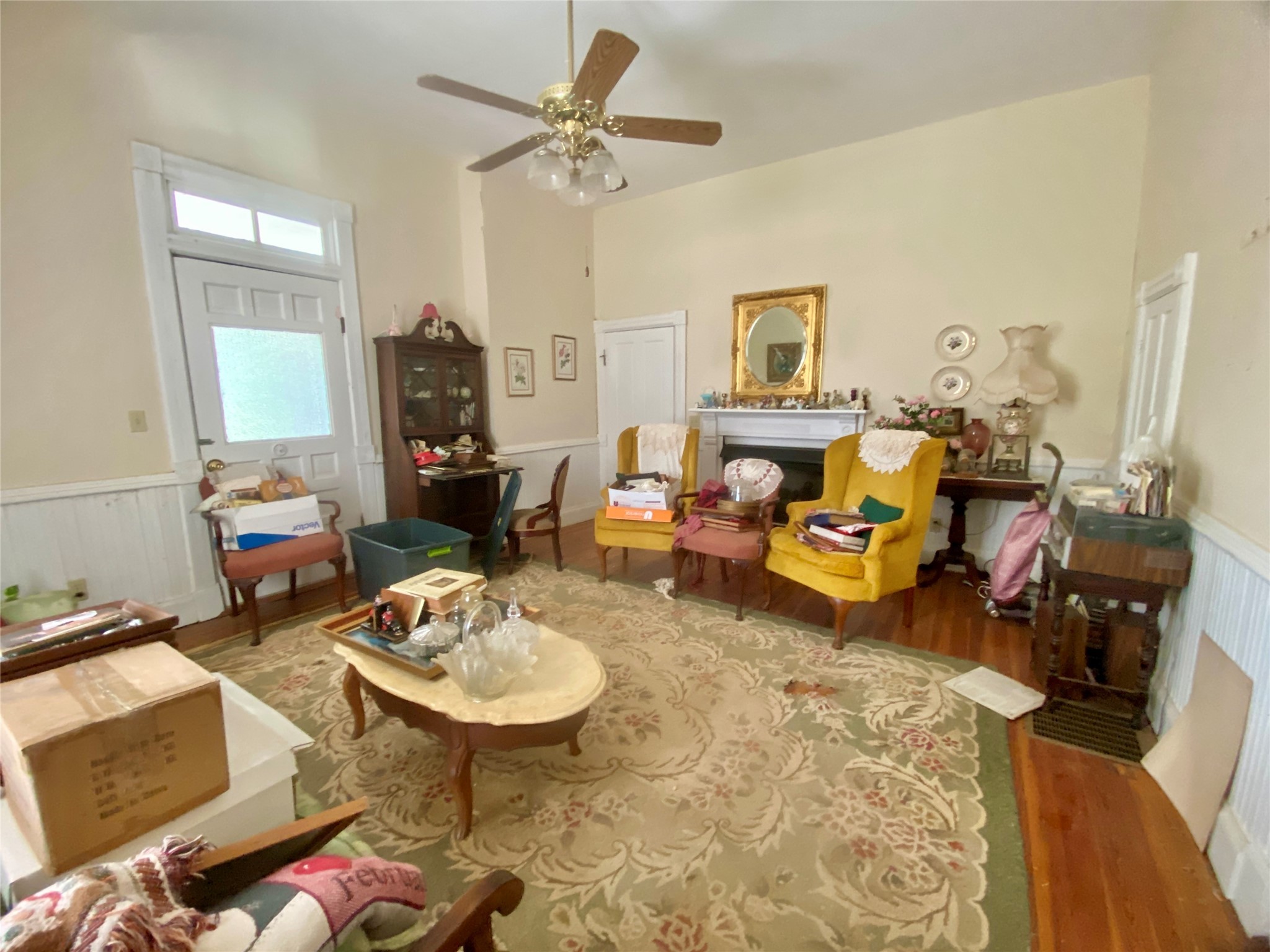 2221 Sandtown Road Washington, GA 30673 - Photo 16 of 50 a living room with furniture a fireplace and a table