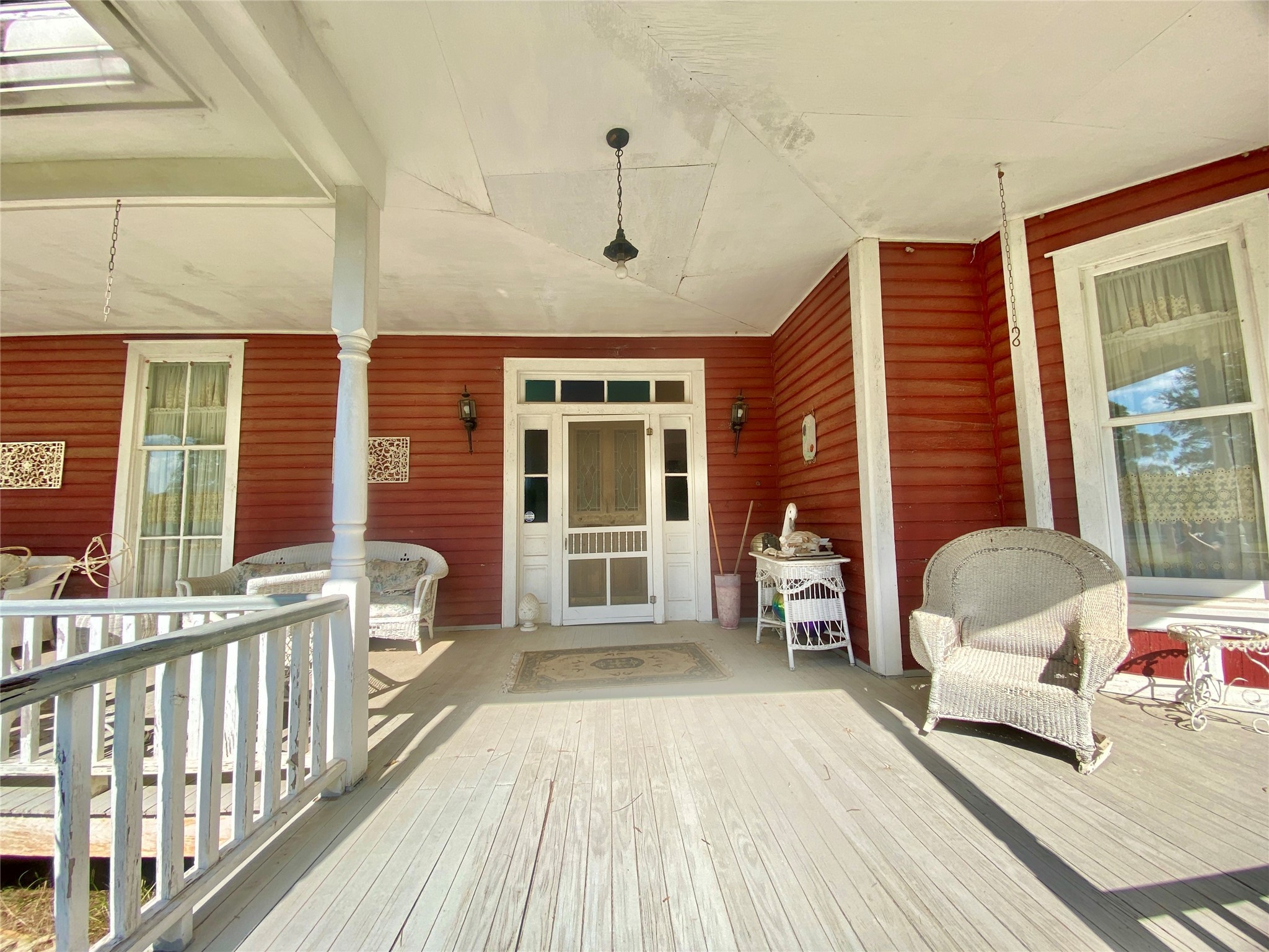 2221 Sandtown Road Washington, GA 30673 - Photo 2 of 50 a balcony with furniture and a window
