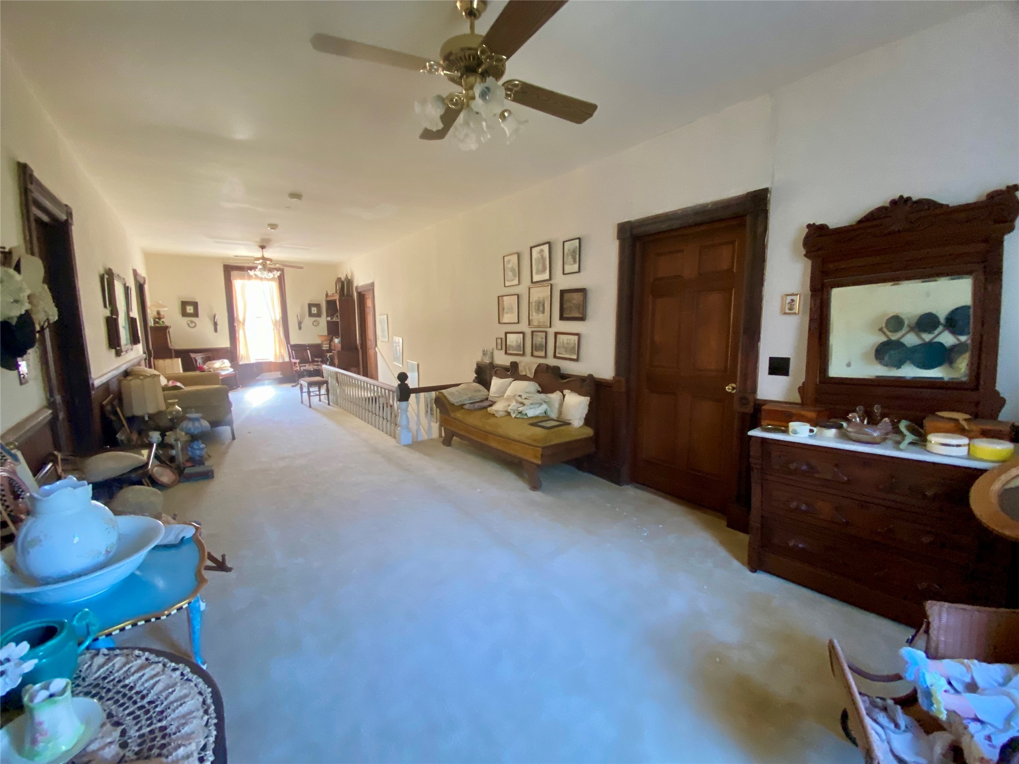 2221 Sandtown Road Washington, GA 30673 - Photo 22 of 50 a room with furniture and a chair