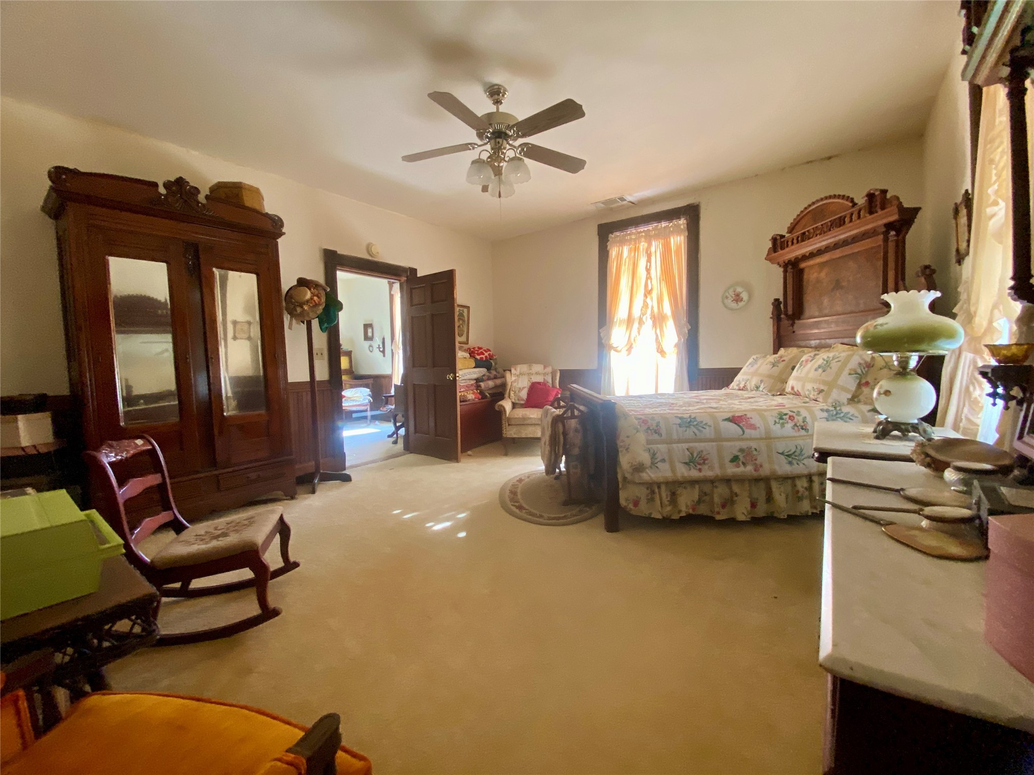 2221 Sandtown Road Washington, GA 30673 - Photo 23 of 50 a bedroom with furniture and a window