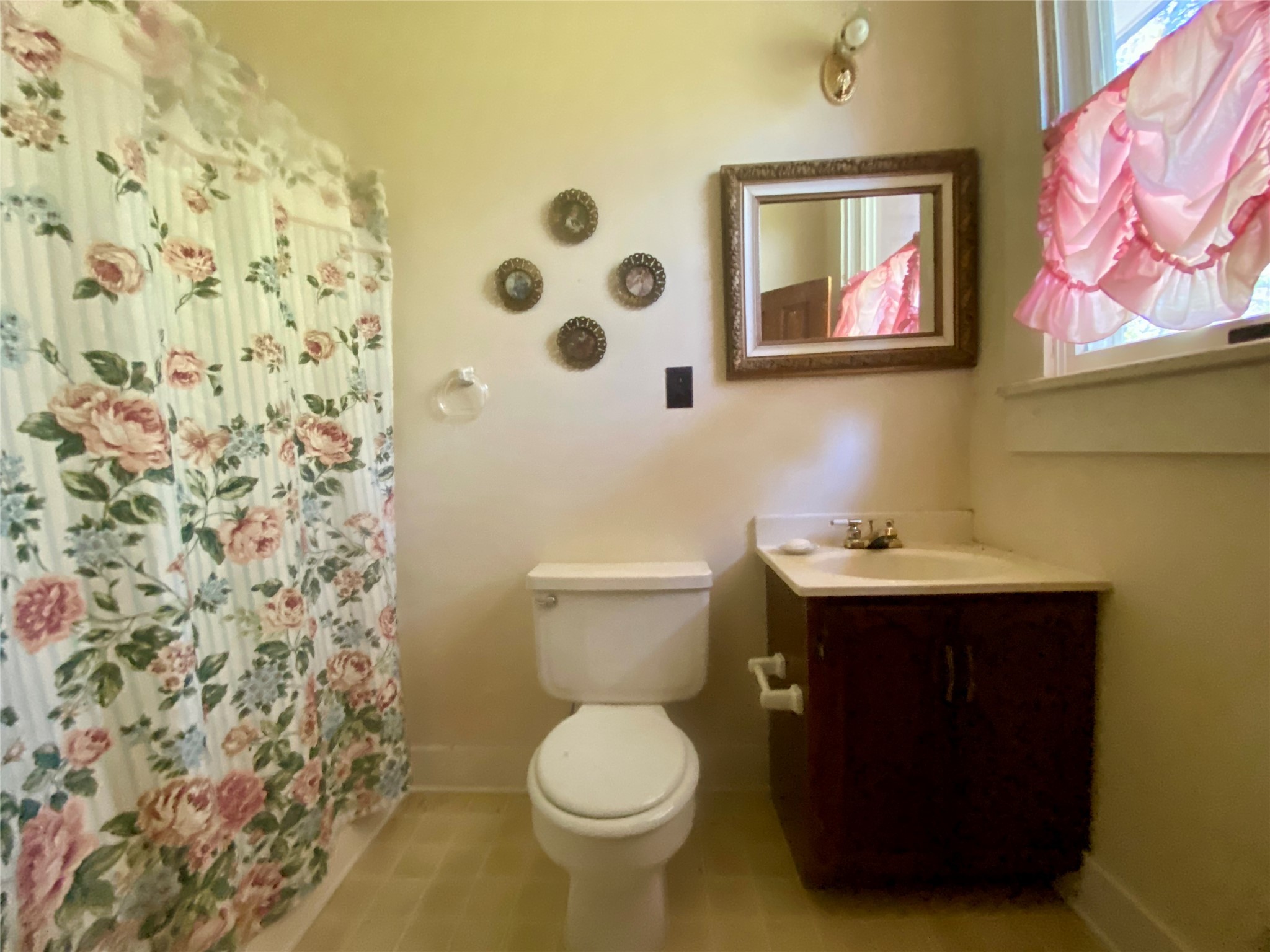 2221 Sandtown Road Washington, GA 30673 - Photo 25 of 50 a bathroom with a toilet and a sink