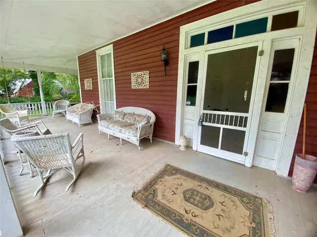 a living room with furniture and a table