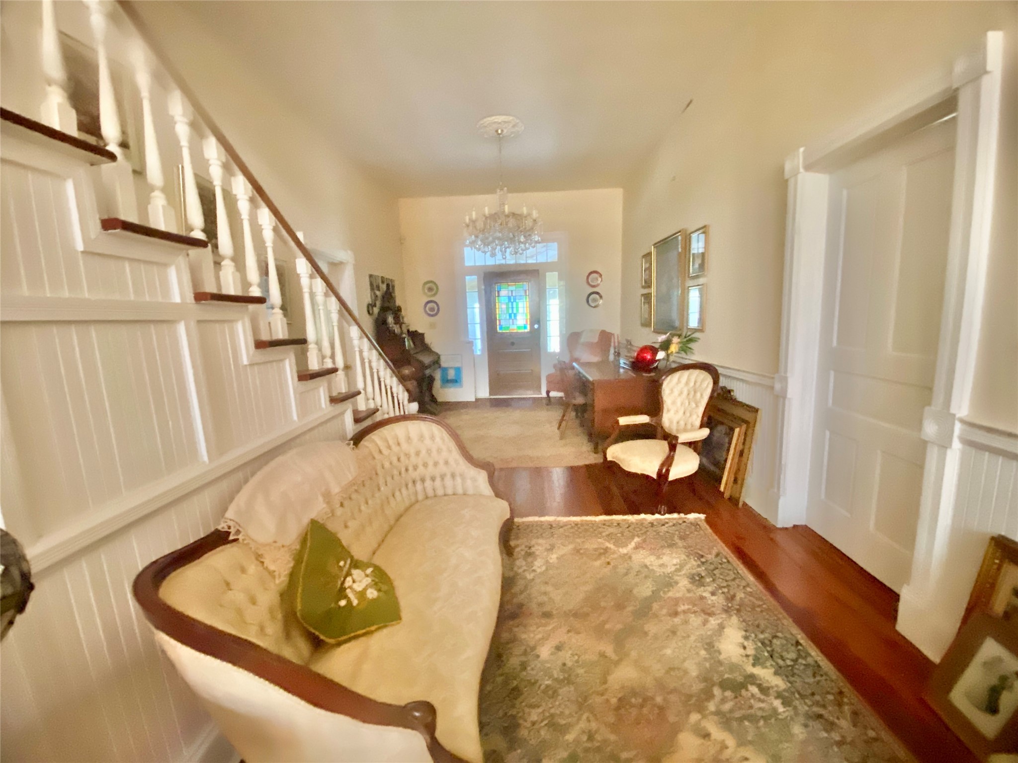 2221 Sandtown Road Washington, GA 30673 - Photo 8 of 50 a living room with furniture and a wooden floor