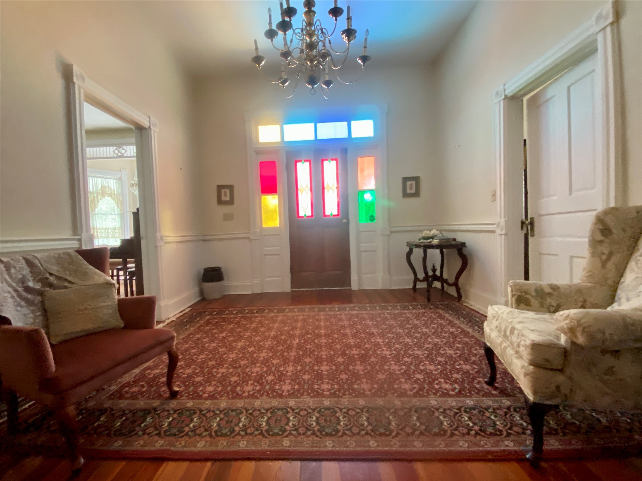 2221 Sandtown Road Washington, GA 30673 - Photo 10 of 50 a living room with furniture and a chandelier