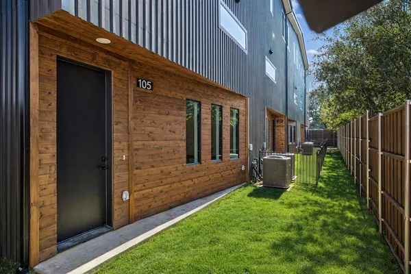a backyard of a house with seating space