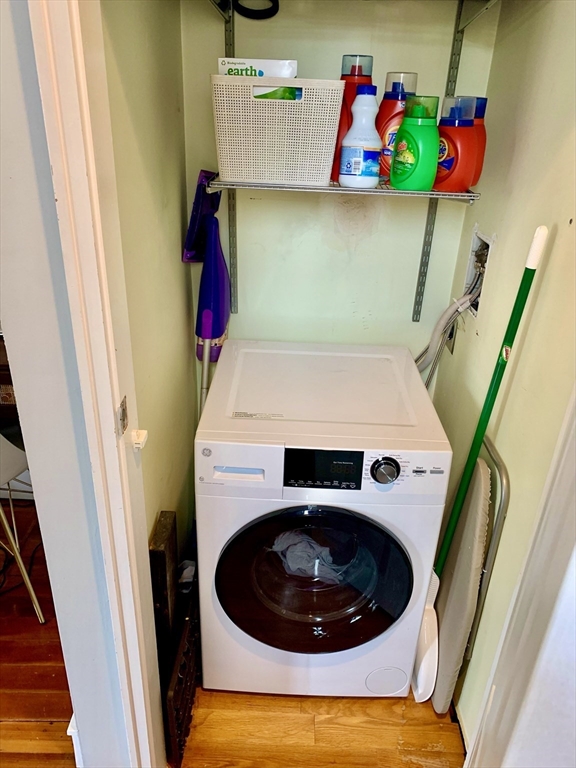 1 Unity Street, Unit 4R Boston, MA 02113 - Photo 12 of 13 a utility room with dryer and washer