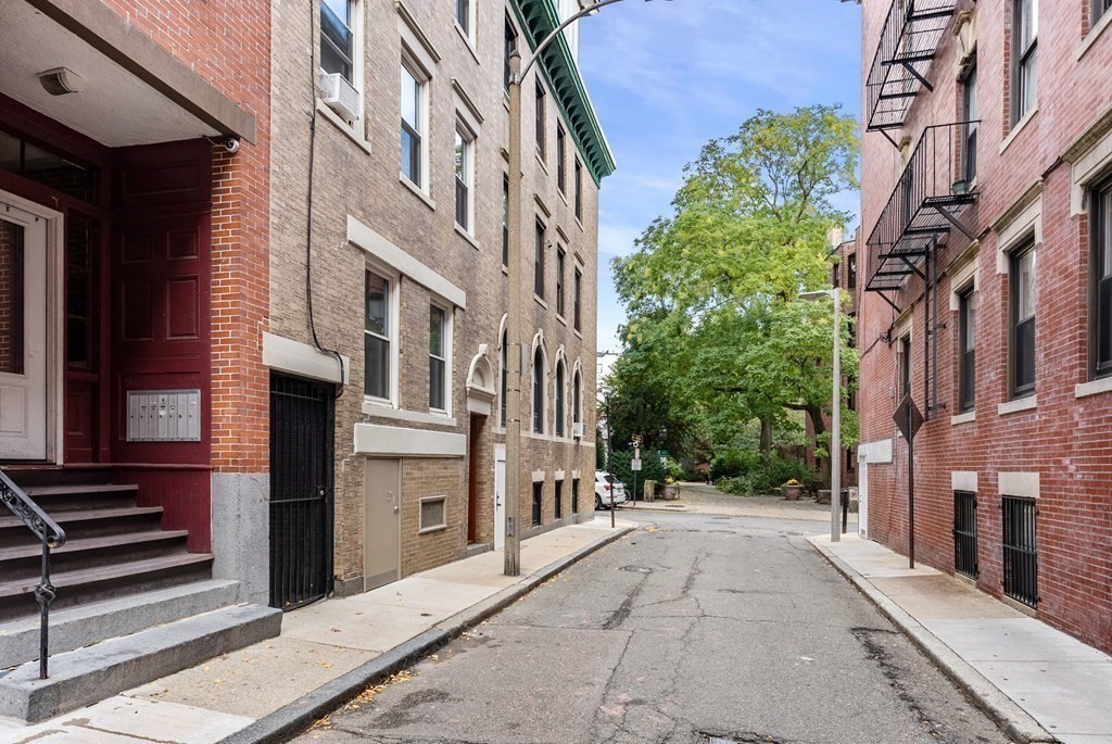 1 Unity Street, Unit 4R Boston, MA 02113 - Photo 2 of 13 a view of a building along a street