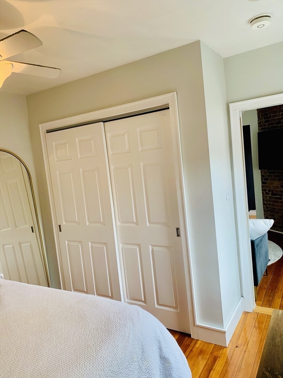 1 Unity Street, Unit 4R Boston, MA 02113 - Photo 10 of 13 a view of a bedroom from a hallway