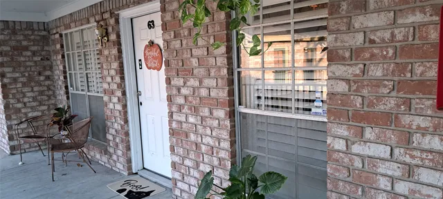 a bathroom with a shower and a sink