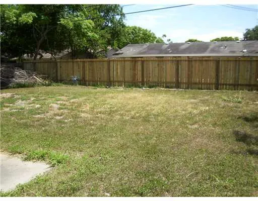 a view of a backyard of a house