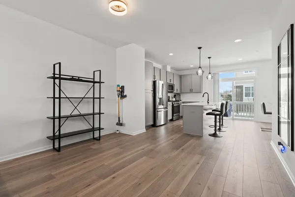 a view of a kitchen and dining room