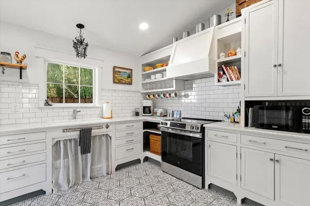 a bedroom with a bed and a bathroom