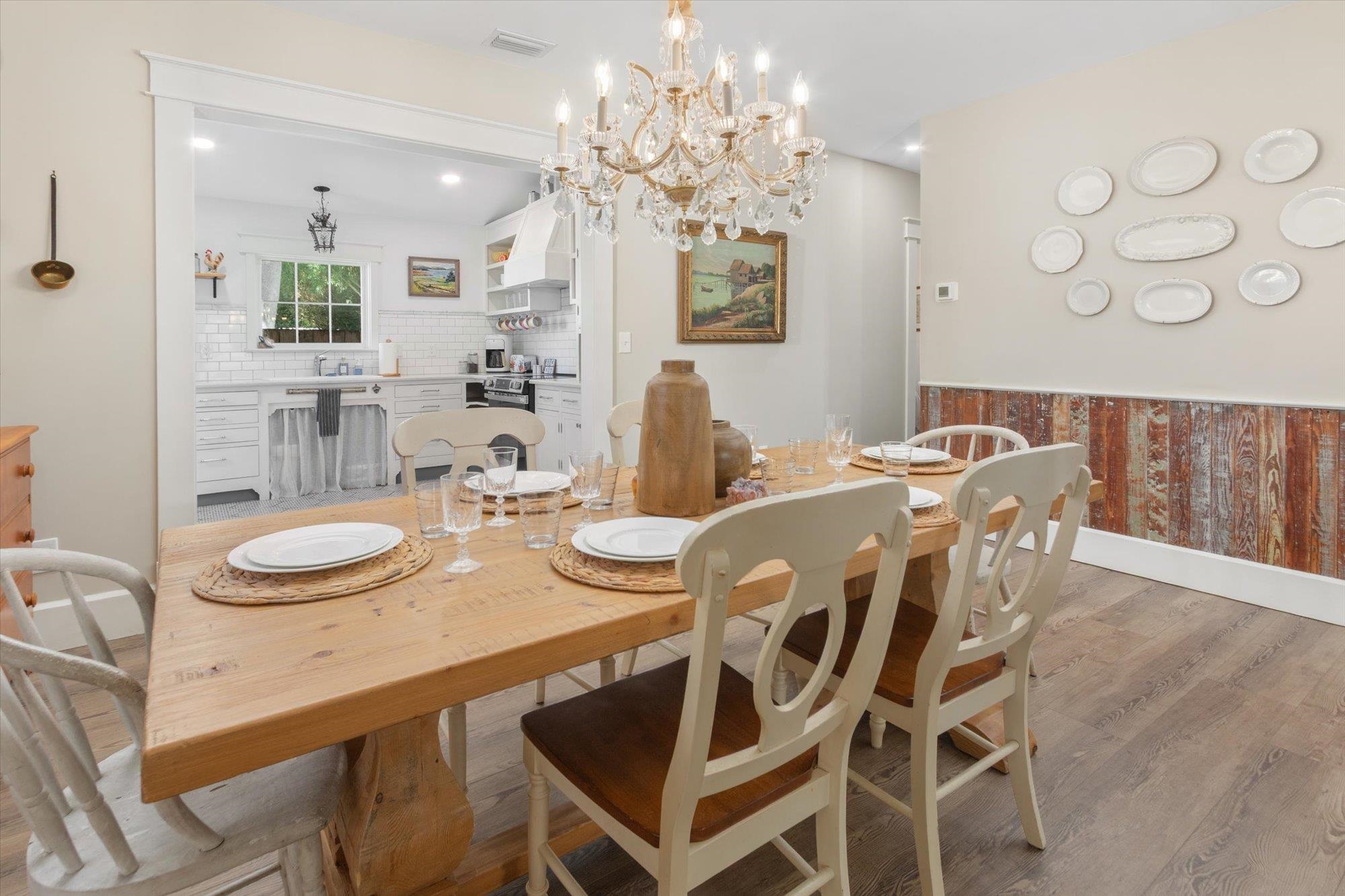 16 Locust Street St. Augustine, FL 32084 - Photo 24 of 75 a view of a dining room with furniture and chandelier