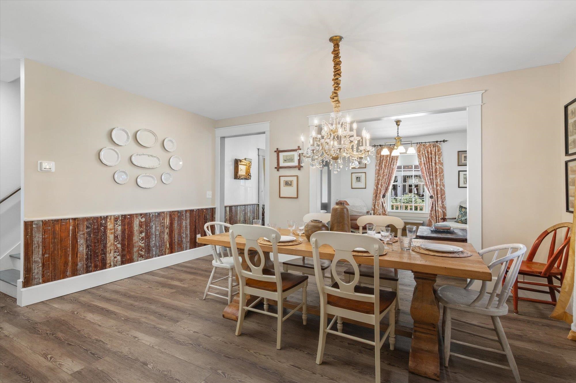 16 Locust Street St. Augustine, FL 32084 - Photo 34 of 76 Dining area featuring dark wood finished floors and a chandelier
