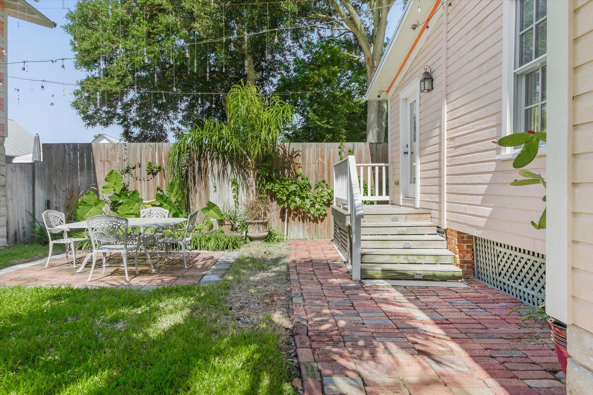 16 Locust Street St. Augustine, FL 32084 - Photo 53 of 76 Fenced backyard featuring a patio
