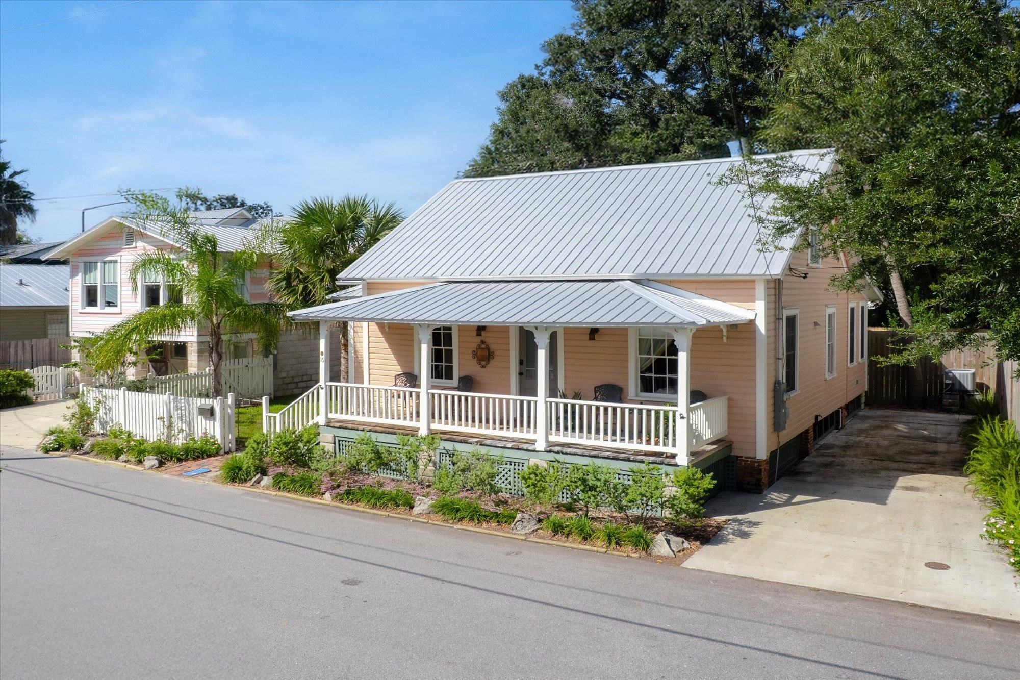 16 Locust Street St. Augustine, FL 32084 - Photo 69 of 76 View of front of property with a porch, a metal roof, and a standing seam roof