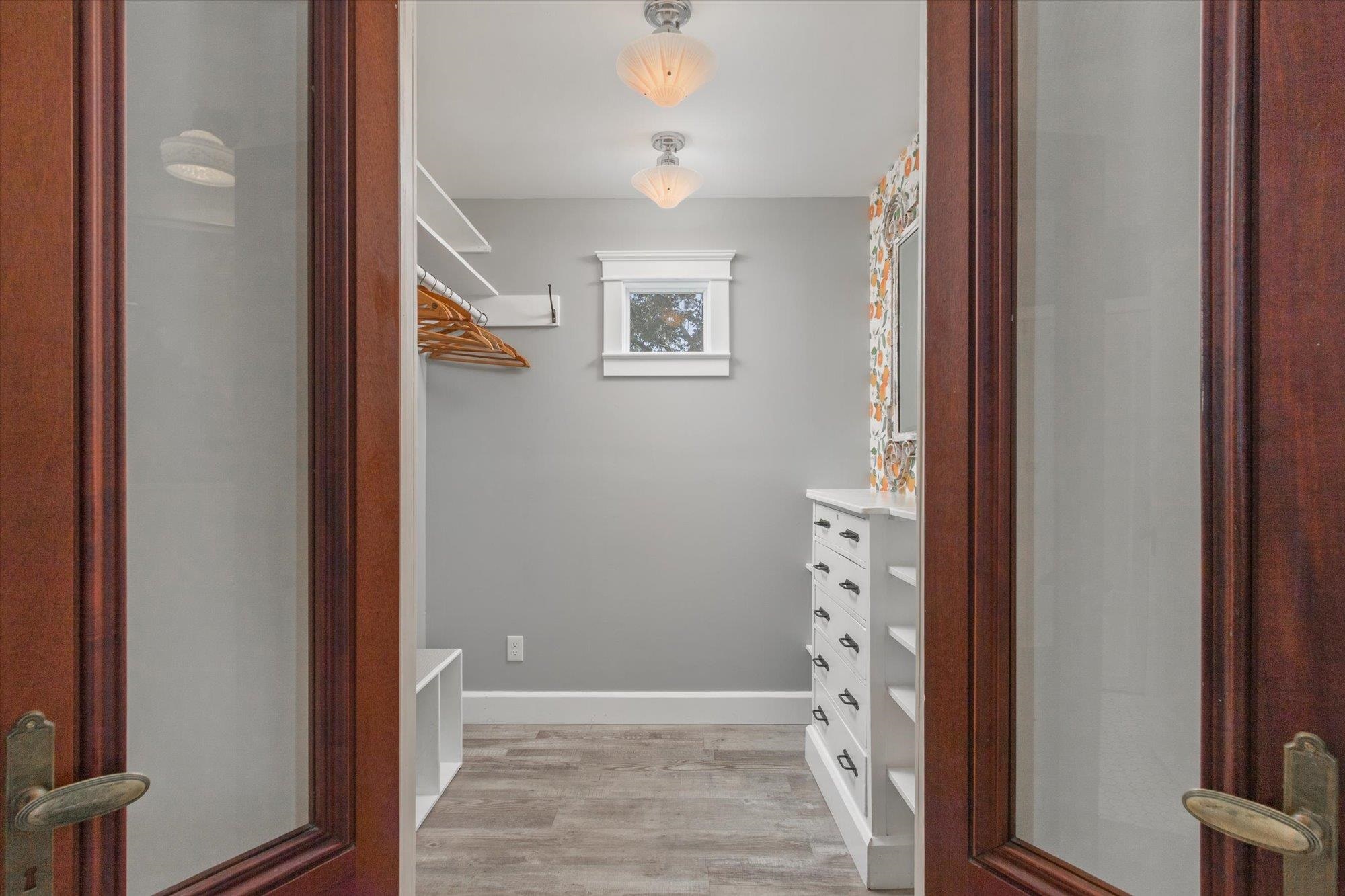 16 Locust Street St. Augustine, FL 32084 - Photo 10 of 76 Walk in closet featuring light wood-type flooring