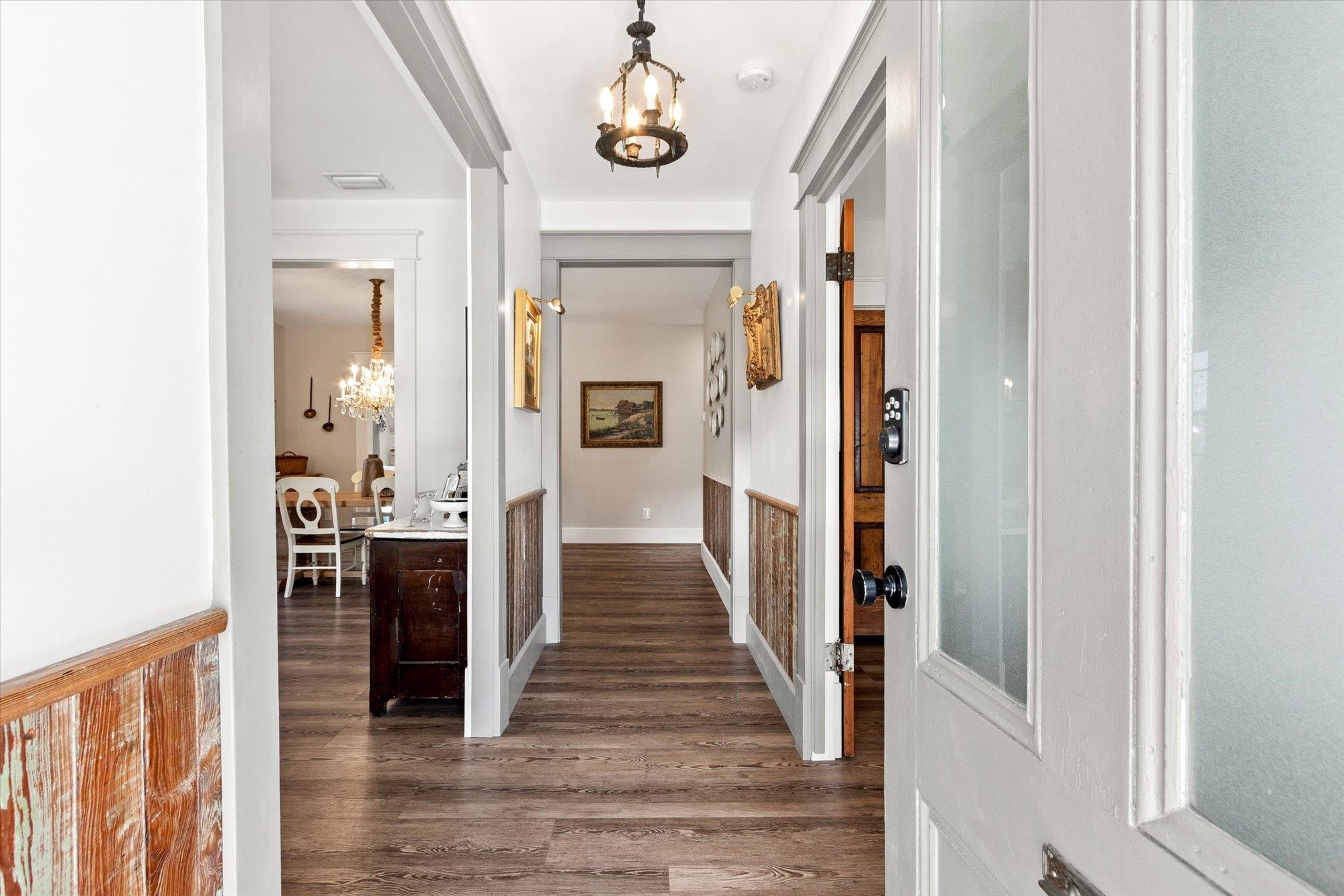 16 Locust Street St. Augustine, FL 32084 - Photo 10 of 75 a view of a hallway with wooden floor and staircase