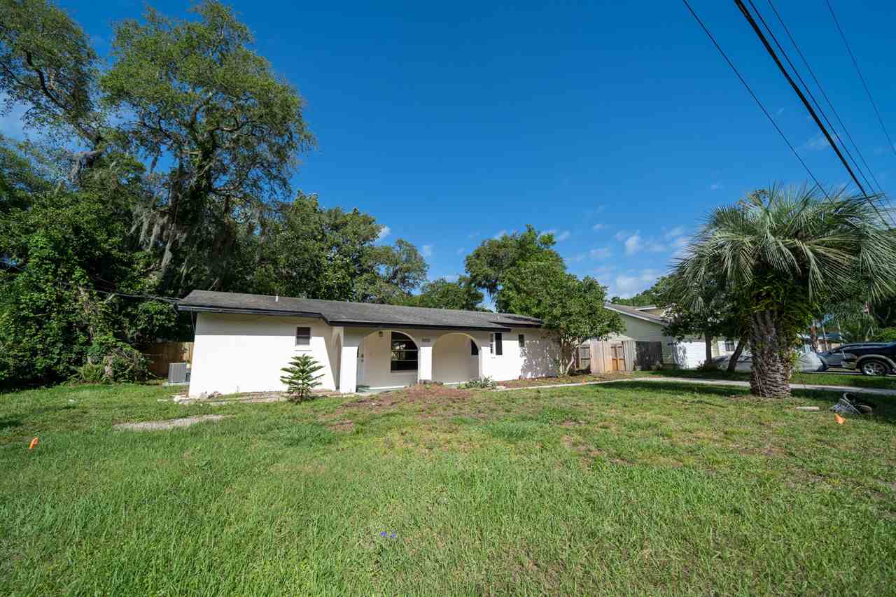 626 Segovia Road St. Augustine, FL 32086 - Photo 2 of 30 a house view with a garden space