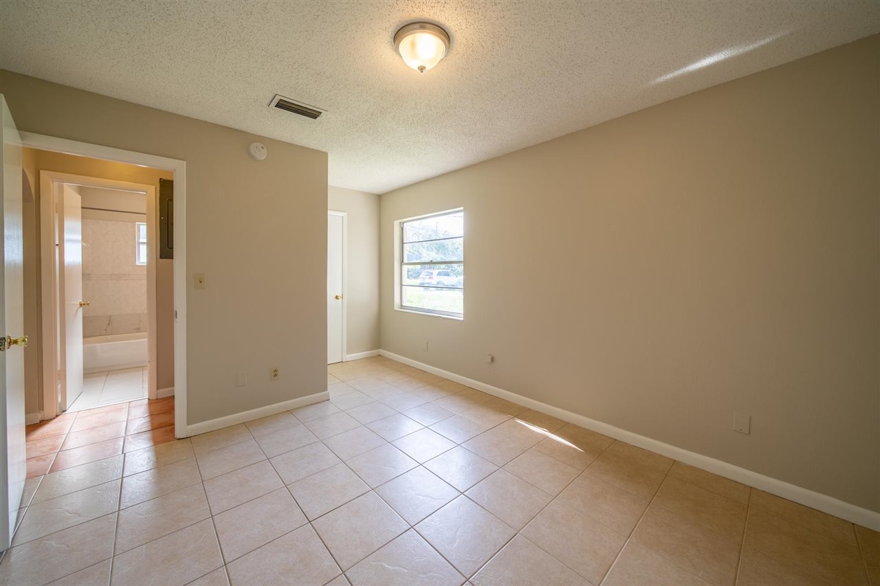 626 Segovia Road St. Augustine, FL 32086 - Photo 19 of 30 a view of an empty room and window