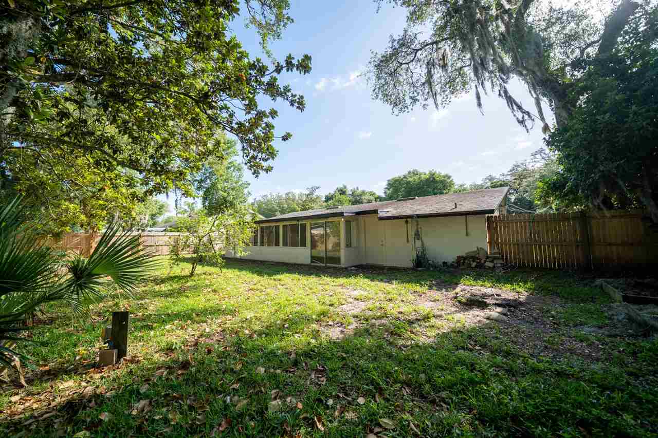 626 Segovia Road St. Augustine, FL 32086 - Photo 29 of 30 a backyard of a house with lots of green space
