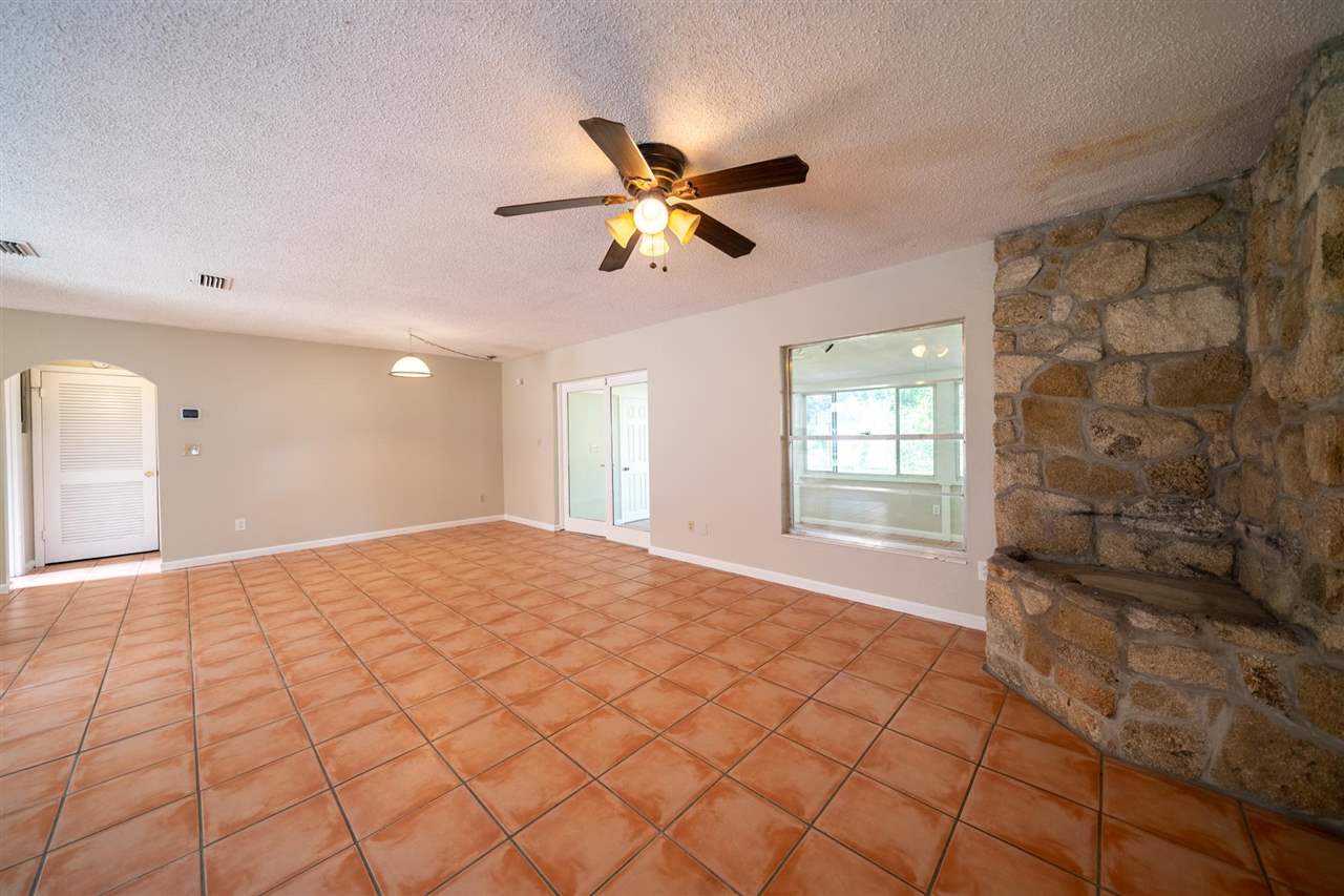 626 Segovia Road St. Augustine, FL 32086 - Photo 7 of 30 a bedroom with a bed and a window