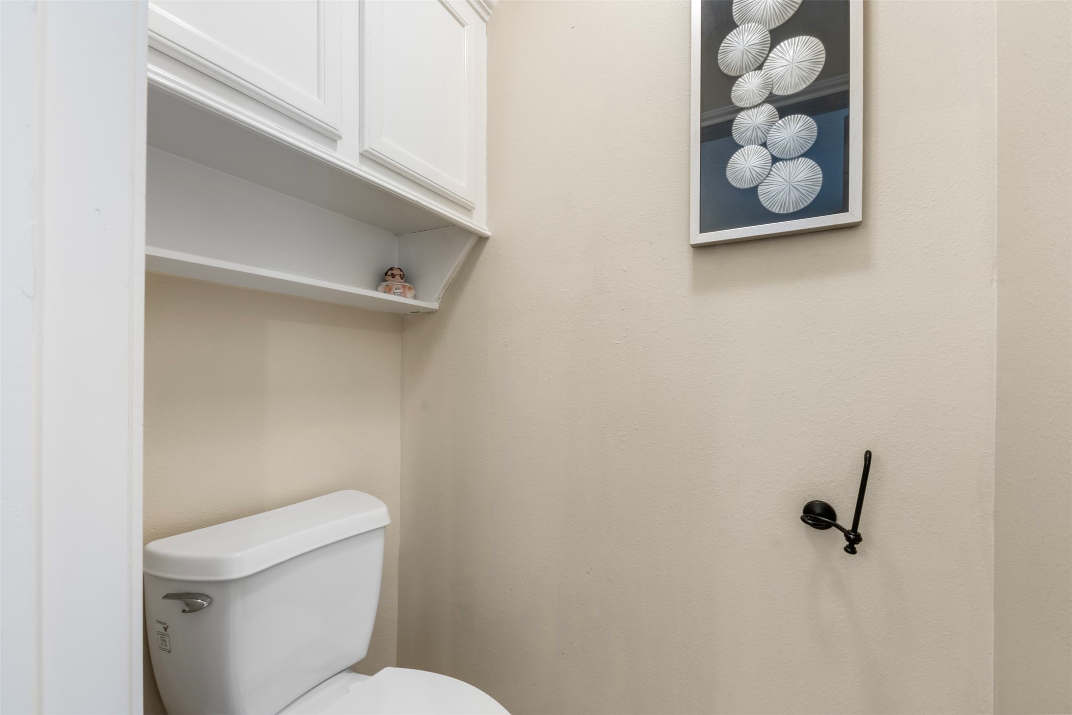 411 Shawnee Conroe, TX 77316 - Photo 19 of 30 a white toilet sitting next to a shower