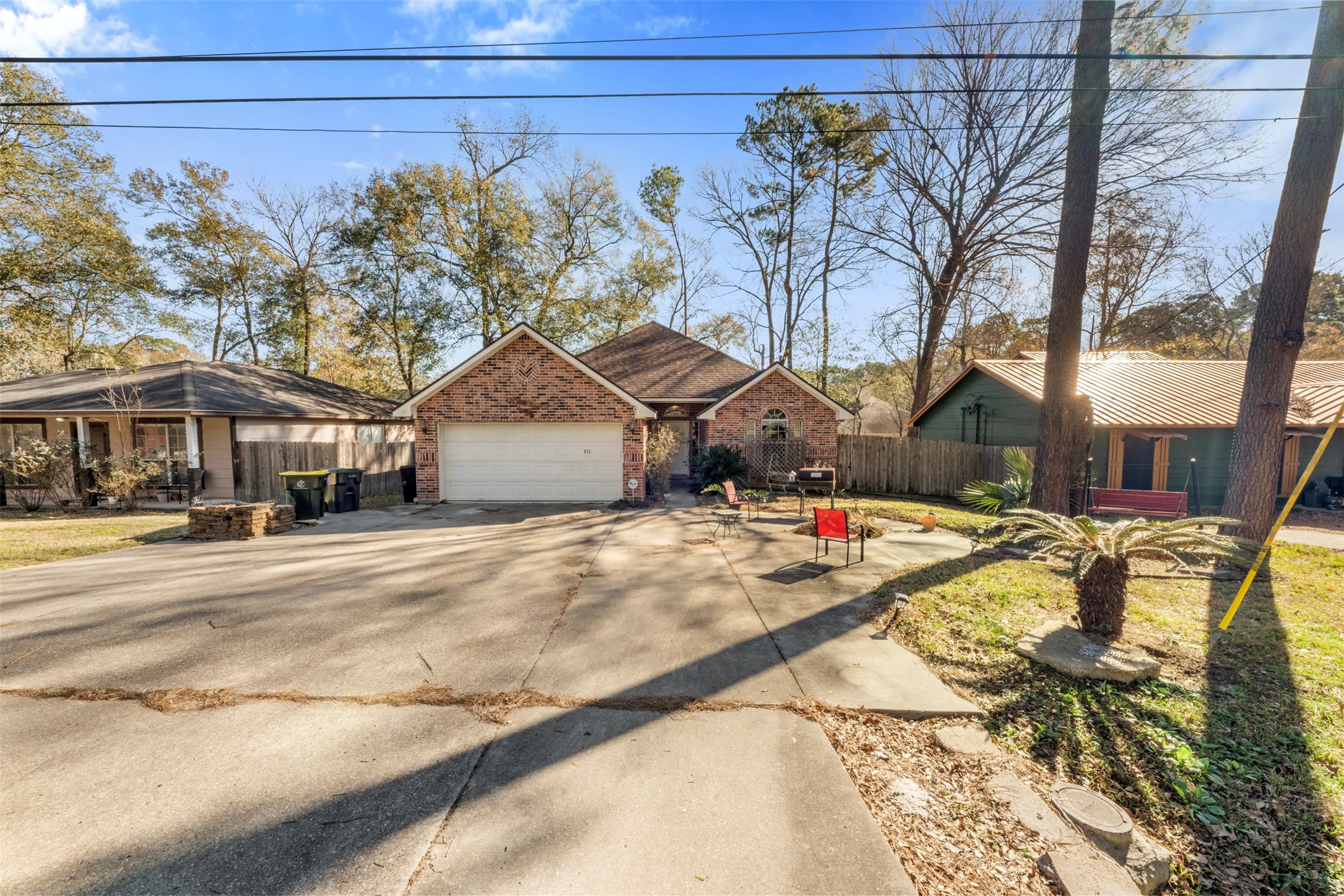 411 Shawnee Conroe, TX 77316 - Photo 23 of 30 a view of outdoor space with swimming pool