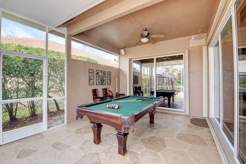 12320 Melrose Way Boca Raton, FL 33428 - Photo 27 of 34 a room with pool table and windows