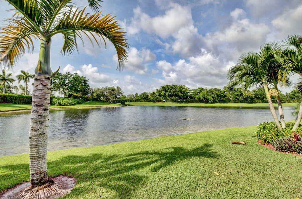 12320 Melrose Way Boca Raton, FL 33428 - Photo 29 of 34 a view of a lake with a yard