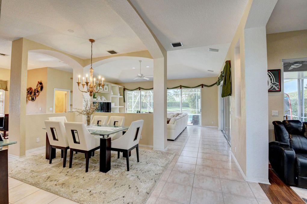 12320 Melrose Way Boca Raton, FL 33428 - Photo 6 of 34 a view of a dining room with furniture