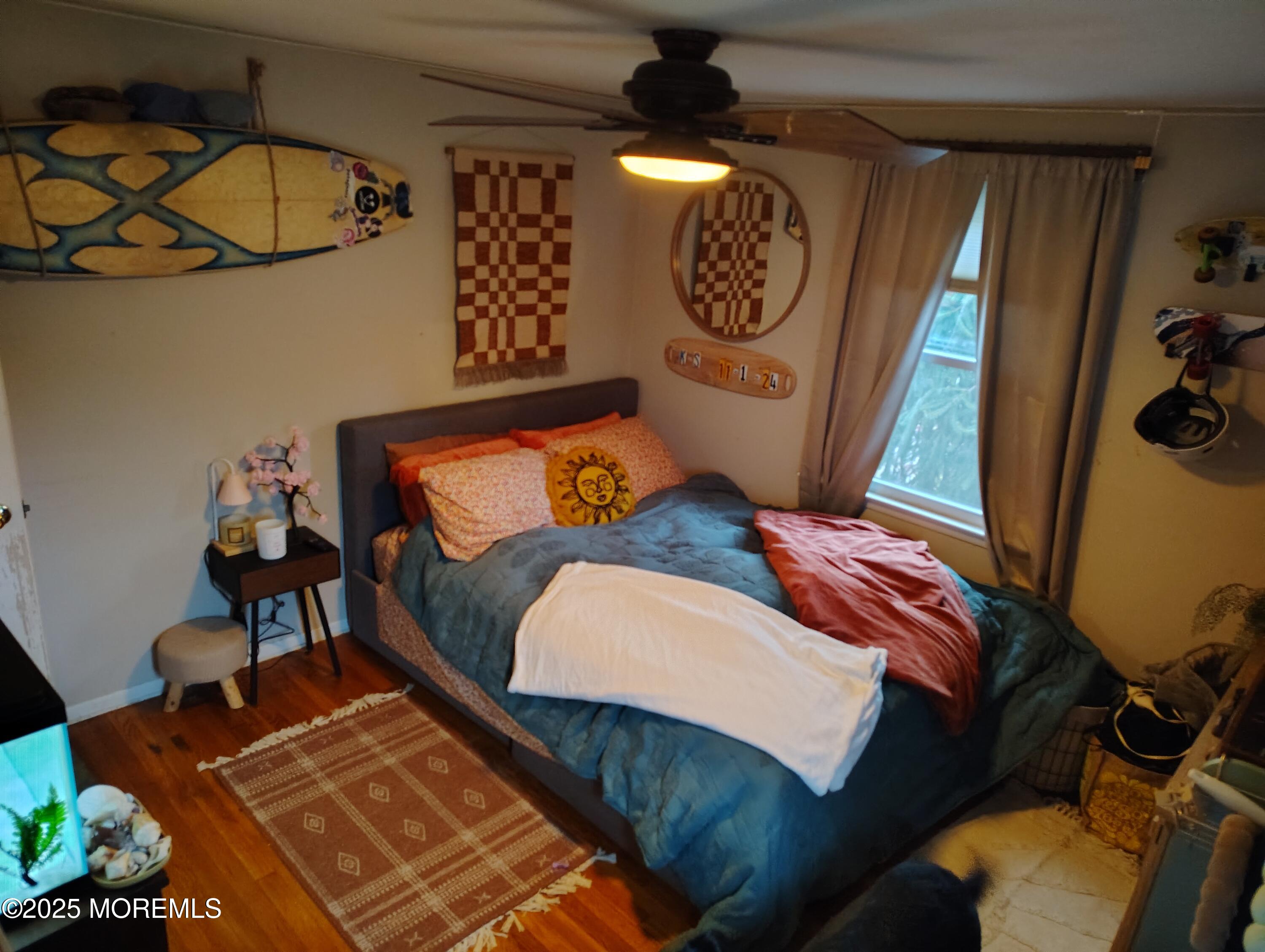434 Shady Lane Howell, NJ 07731 - Photo 13 of 15 a bedroom with a bed and a dresser in it
