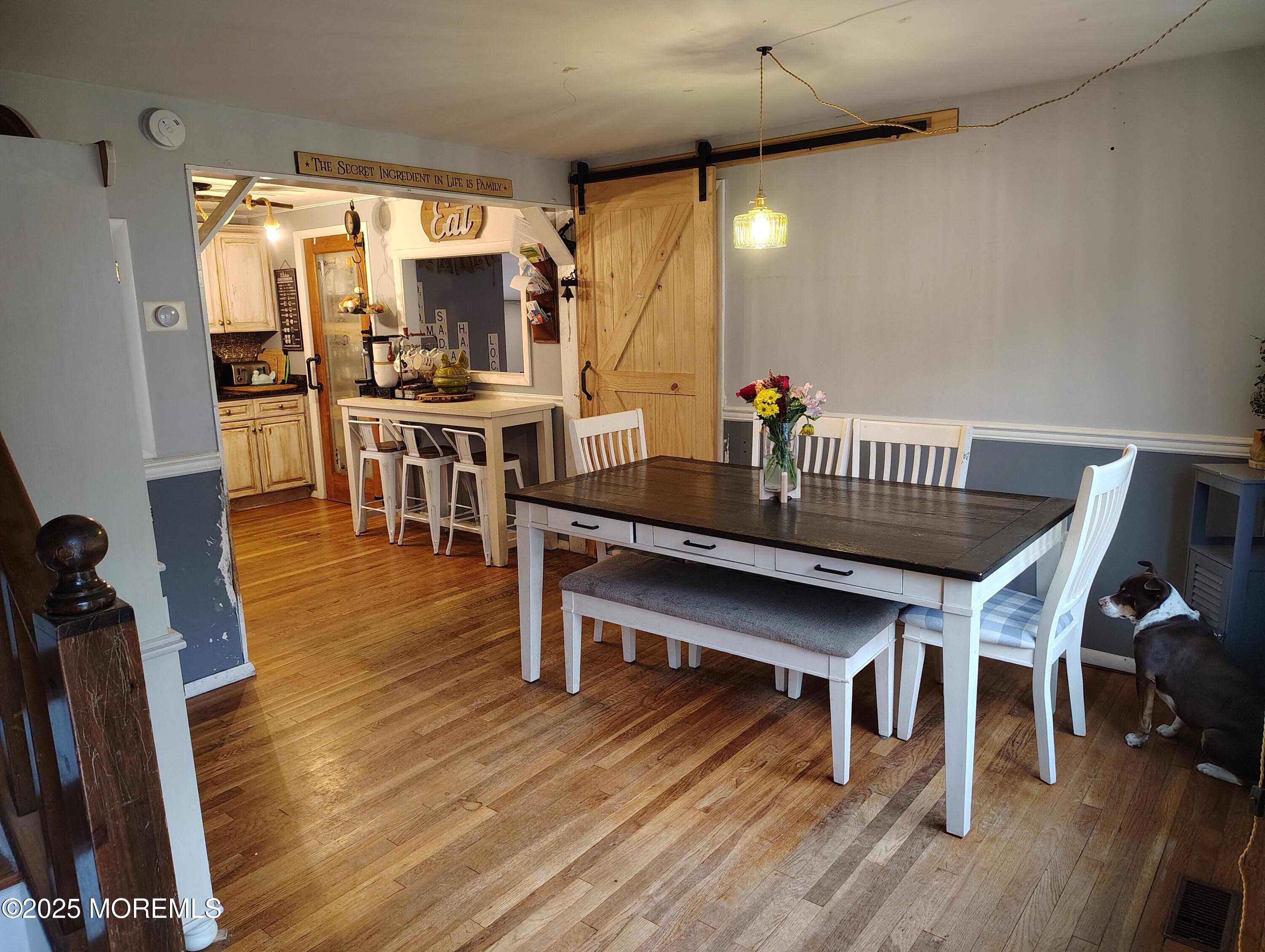 434 Shady Lane Howell, NJ 07731 - Photo 3 of 15 a view of a dining room with furniture and wooden floor