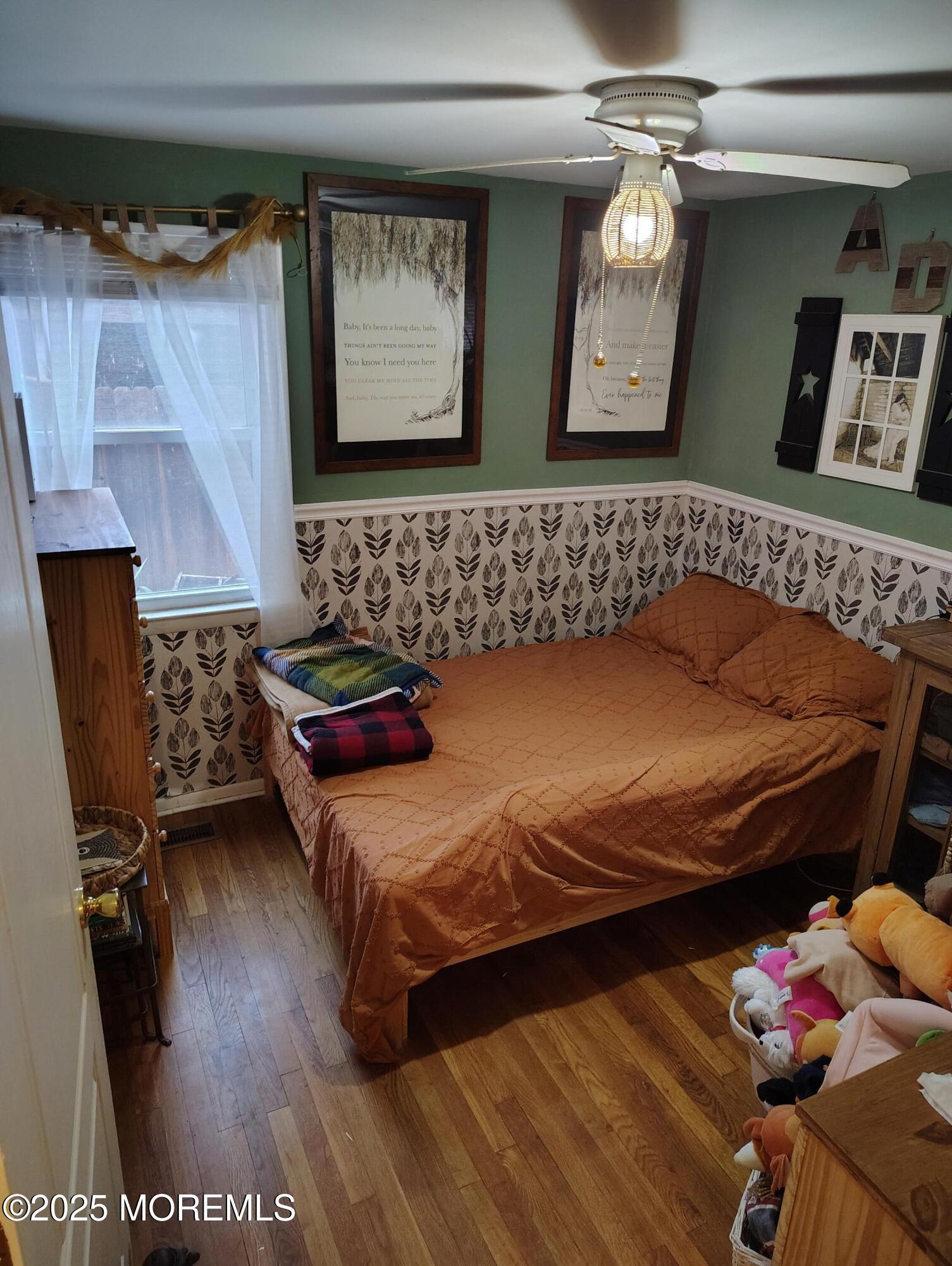 434 Shady Lane Howell, NJ 07731 - Photo 9 of 15 a bedroom with a bed and a dresser