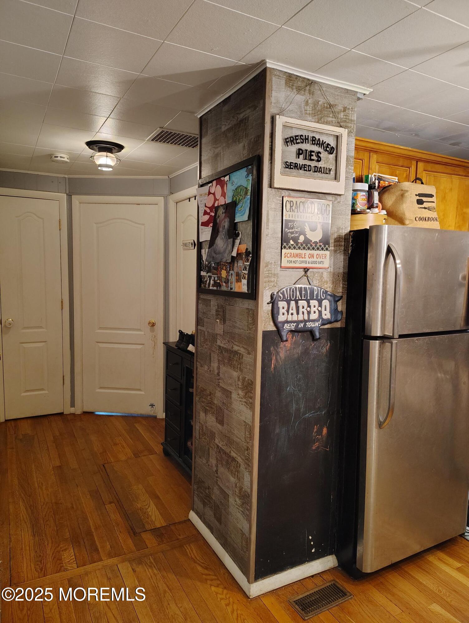 434 Shady Lane Howell, NJ 07731 - Photo 10 of 15 a view of a refrigerator in kitchen