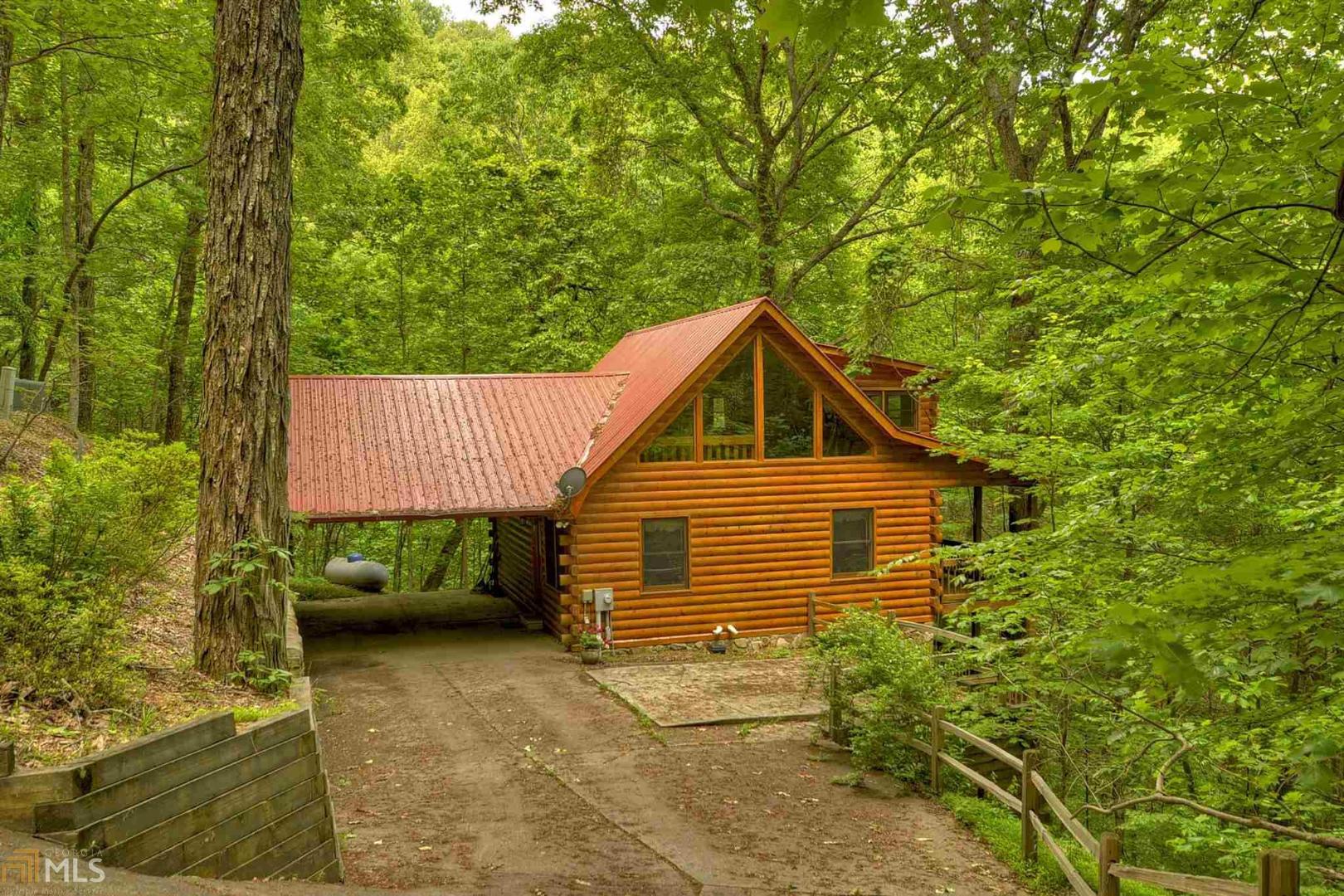 95 Scenic Hollow Lane Blue Ridge, GA 30513 - Photo 1 of 1 a view of backyard of house