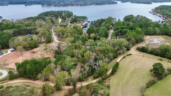 a view of a lake with a house