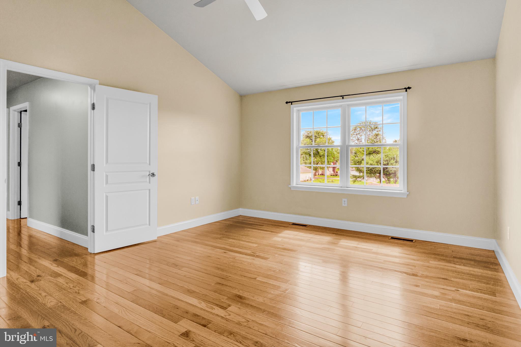 25 Springbrook Drive Palmyra, PA 17078 - Photo 20 of 34 an empty room with wooden floor and windows