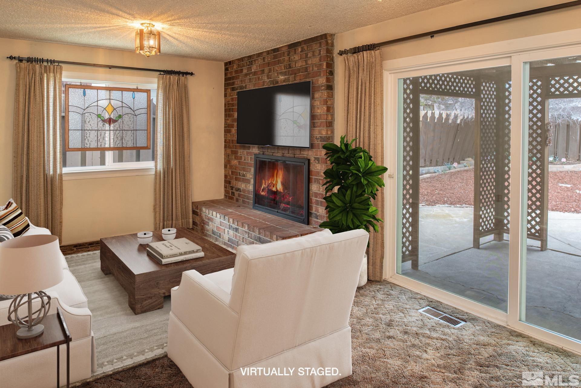 2055 Prince Way Reno, NV 89503 - Photo 11 of 35 a living room with furniture and a window