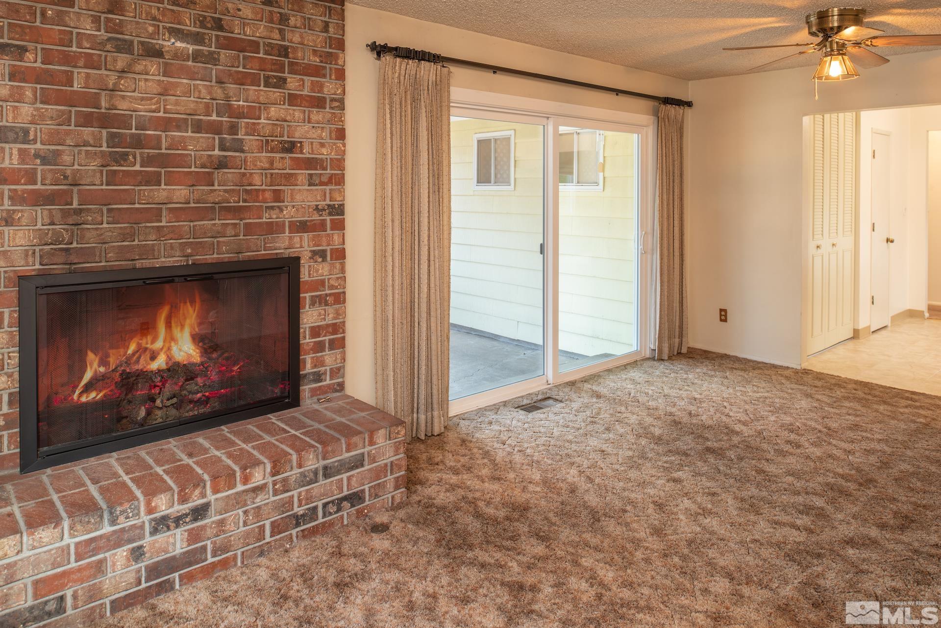 2055 Prince Way Reno, NV 89503 - Photo 12 of 35 a view of an empty room with a fireplace