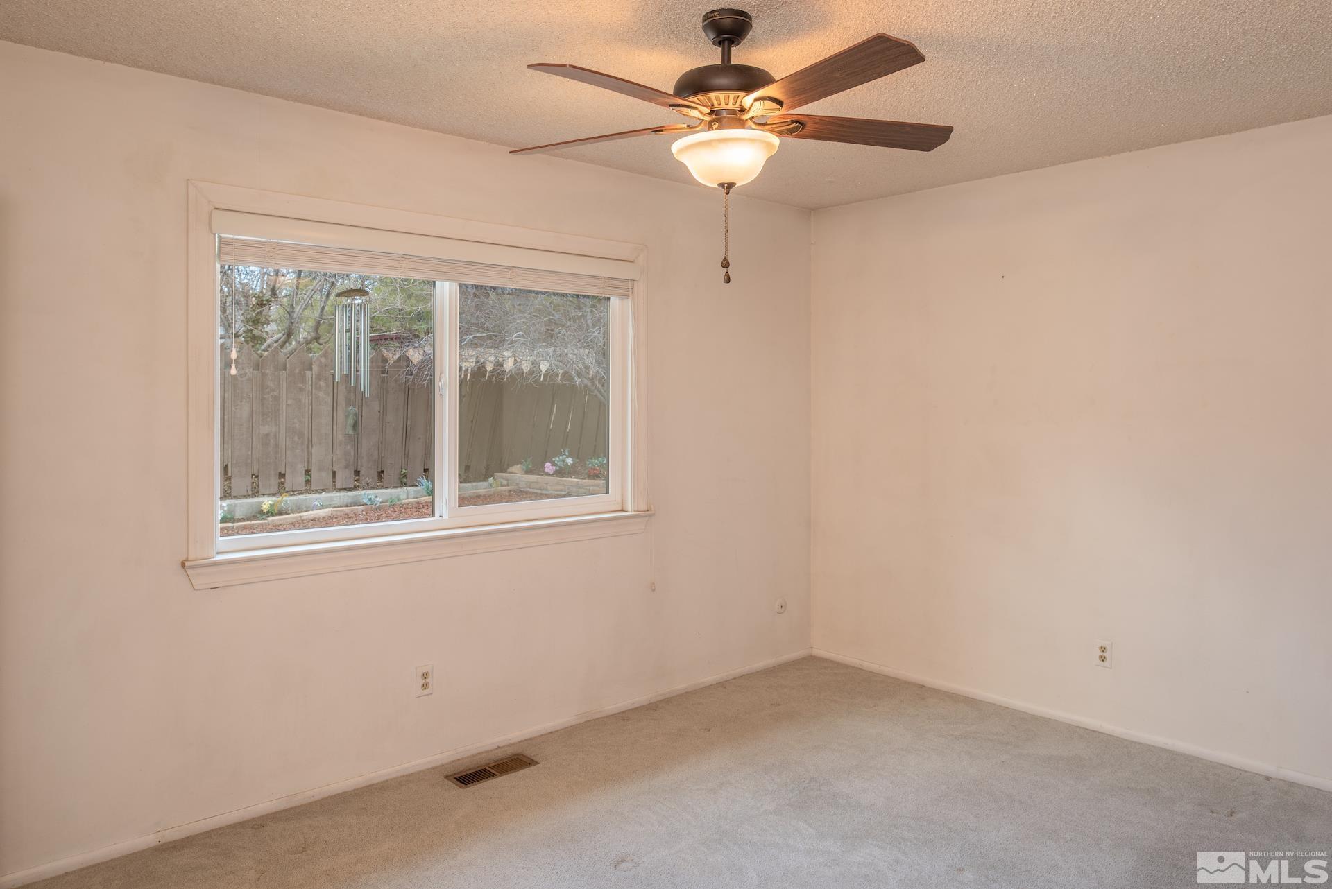 2055 Prince Way Reno, NV 89503 - Photo 13 of 35 an empty room with a window