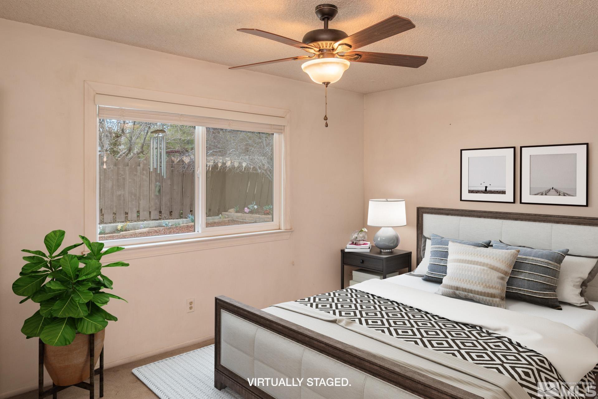 2055 Prince Way Reno, NV 89503 - Photo 14 of 35 a bedroom with a bed and a window