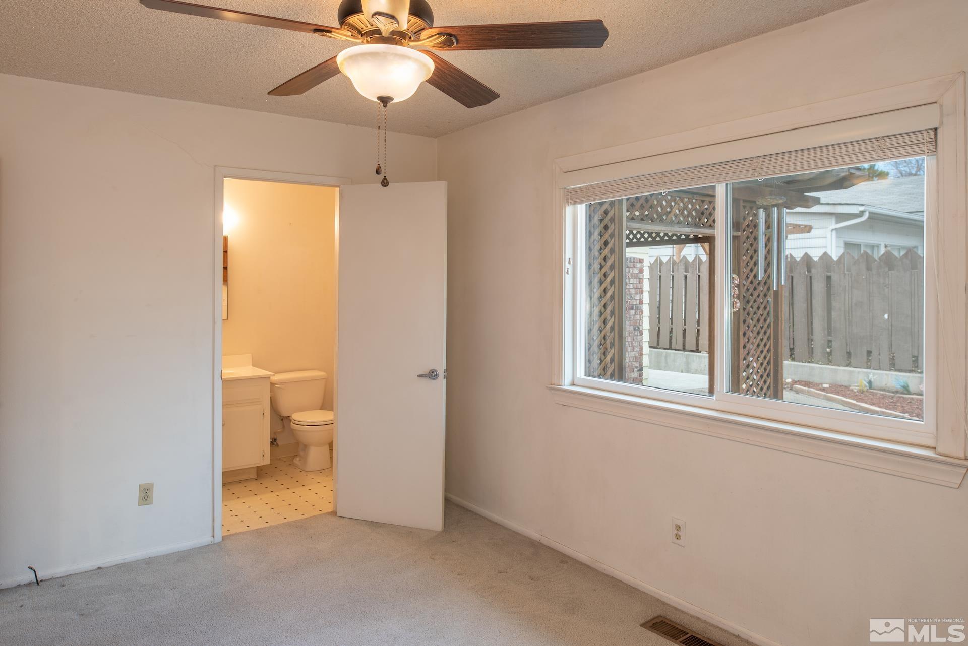 2055 Prince Way Reno, NV 89503 - Photo 15 of 35 a view of a room with a windows and chandelier fan