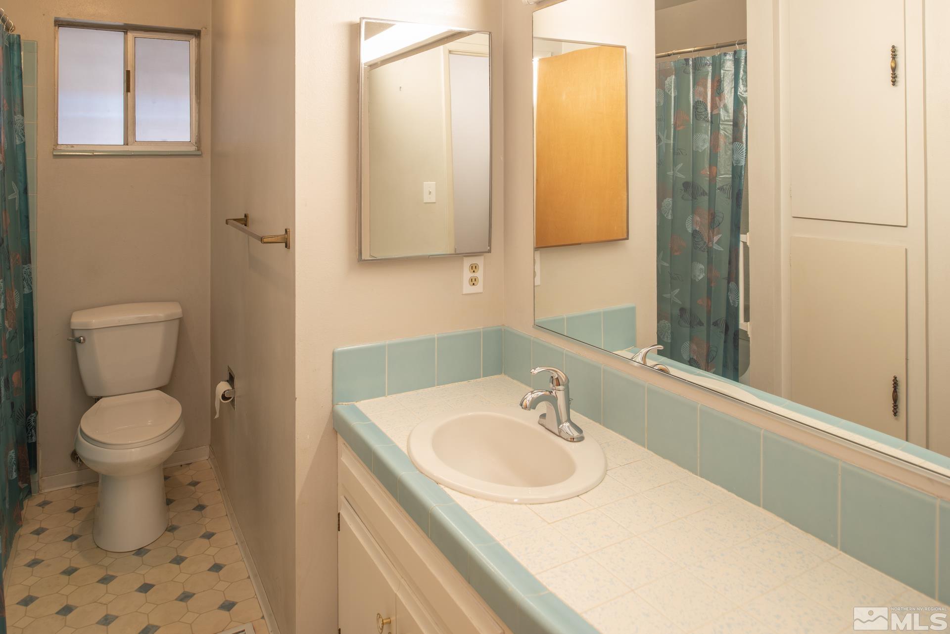 2055 Prince Way Reno, NV 89503 - Photo 19 of 35 a bathroom with a sink toilet and shower