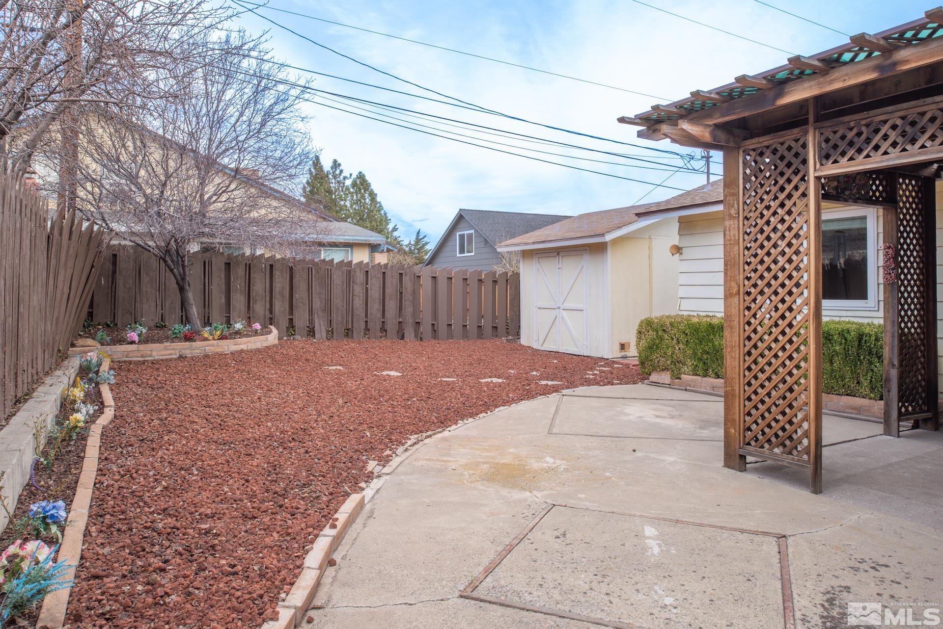 2055 Prince Way Reno, NV 89503 - Photo 28 of 35 a view of a house with a small yard and wooden fence