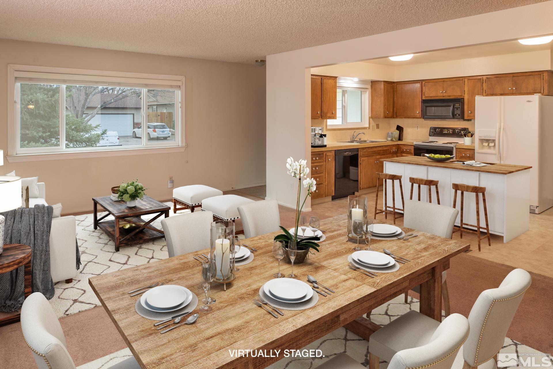 2055 Prince Way Reno, NV 89503 - Photo 3 of 35 a open dining room with furniture a window and kitchen view