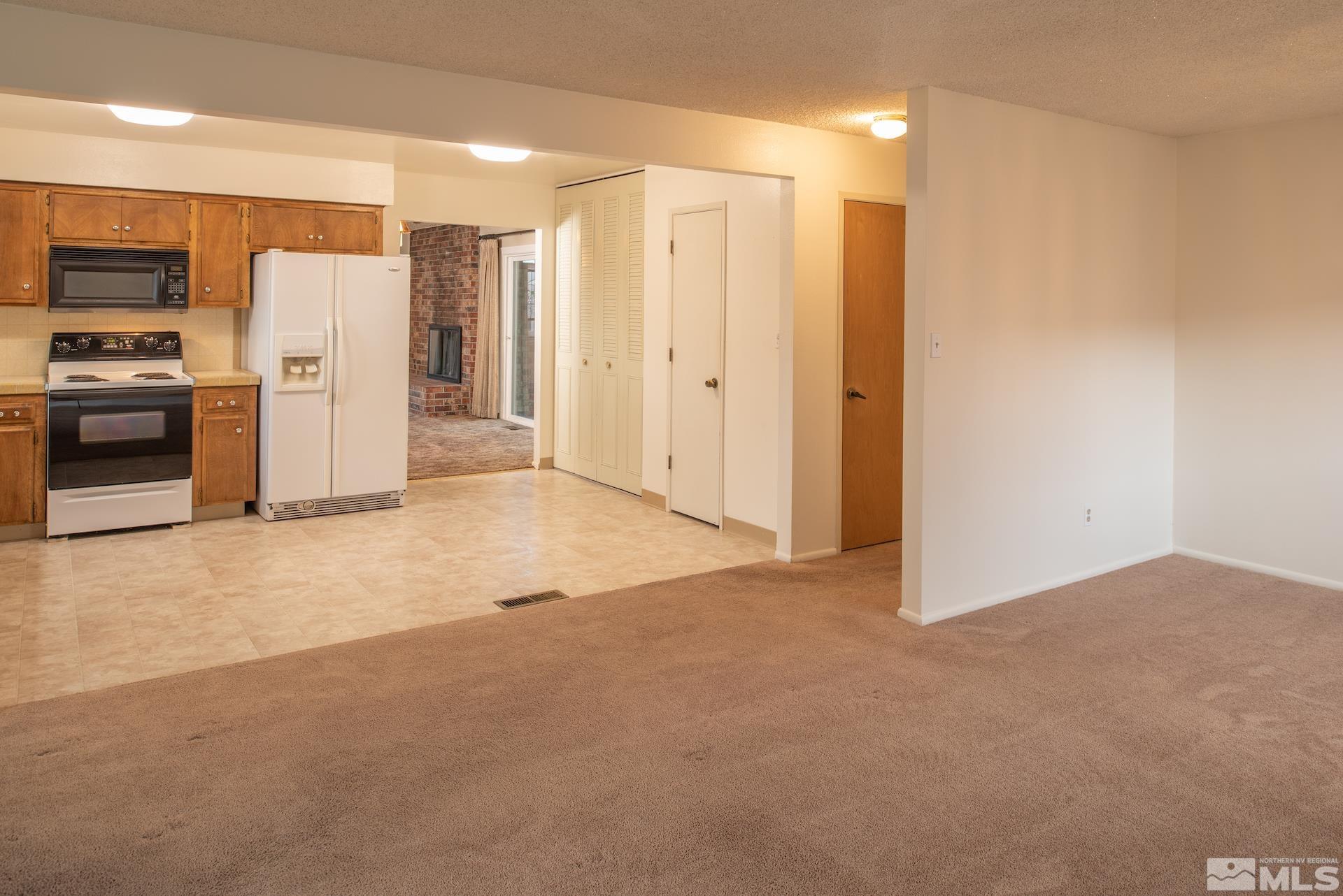 2055 Prince Way Reno, NV 89503 - Photo 4 of 35 a view of empty room with a kitchen
