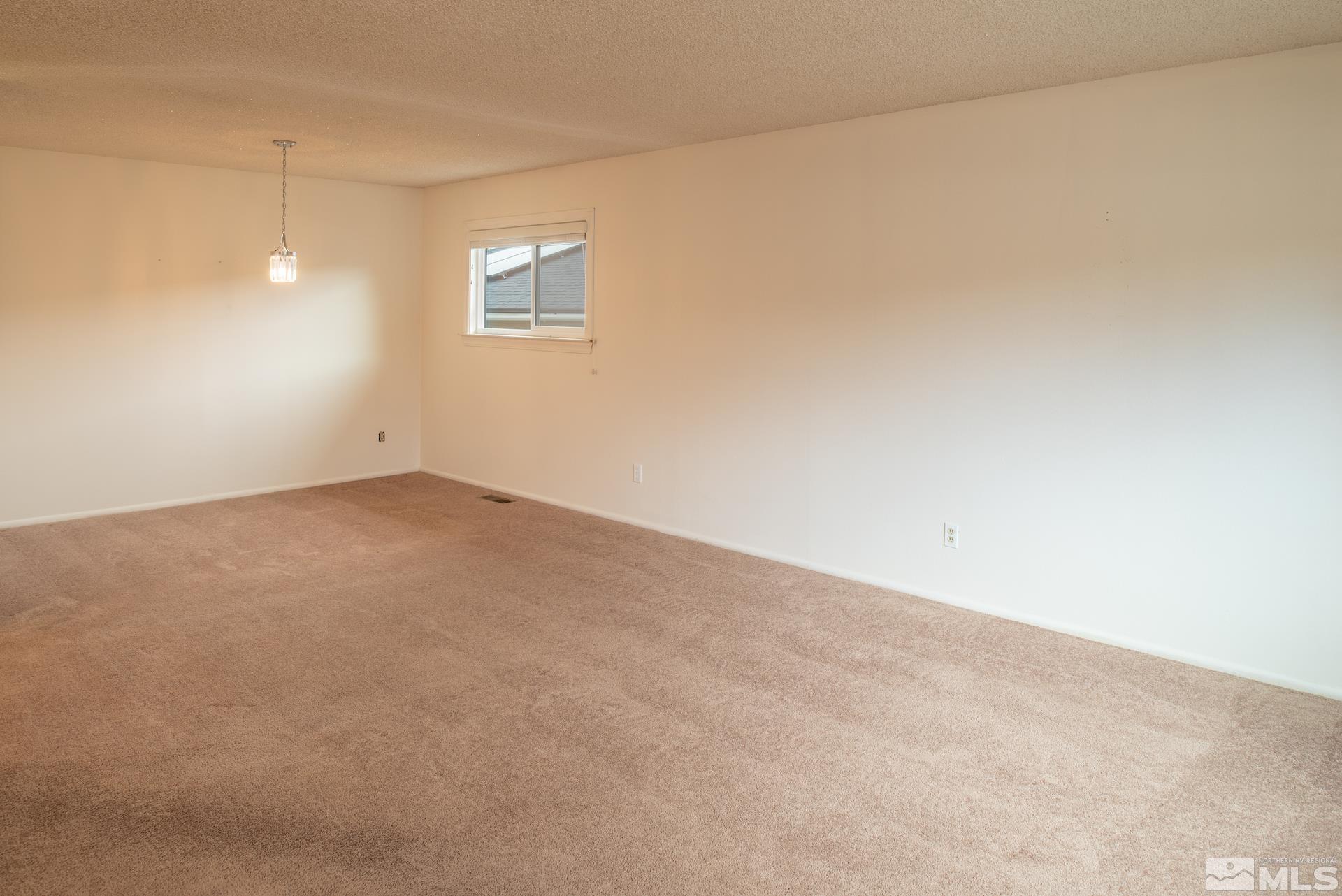 2055 Prince Way Reno, NV 89503 - Photo 5 of 35 en empty room with windows