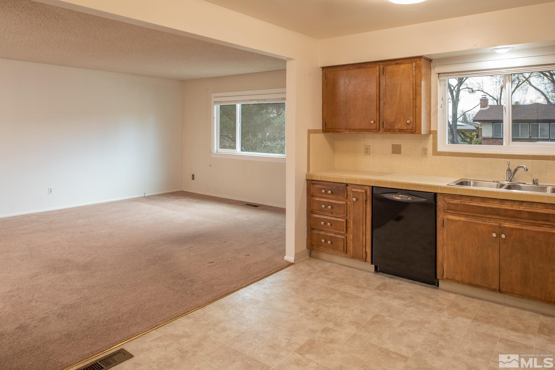 2055 Prince Way Reno, NV 89503 - Photo 8 of 35 a kitchen with a sink and cabinets